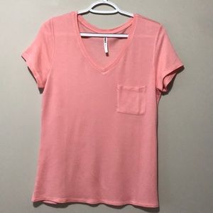 Tresics peach colored T-shirt